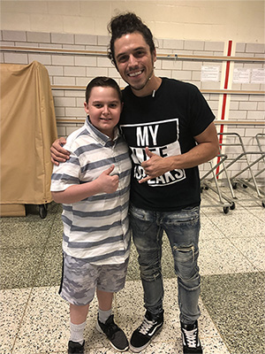 Nathan with a student